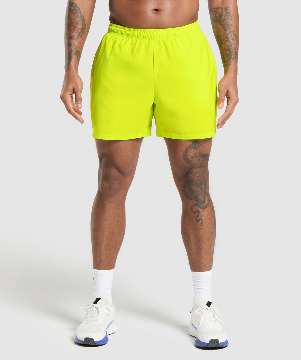 gymshark-arrival-5-shorts-shock-green-ss25