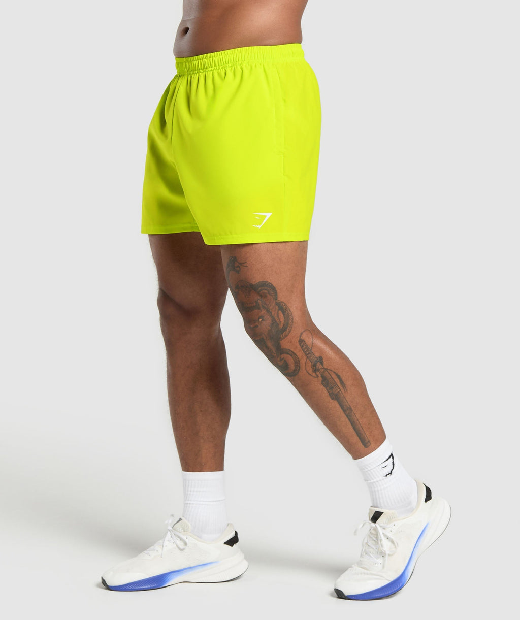 gymshark-arrival-5-shorts-shock-green-ss25