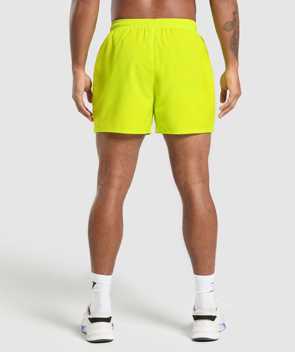 gymshark-arrival-5-shorts-shock-green-ss25
