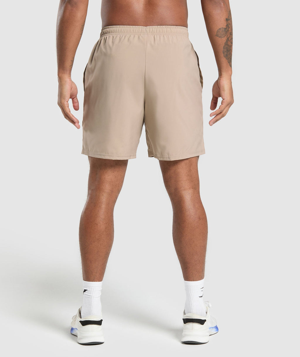 gymshark-arrival-7-shorts-cement-brown-ss25