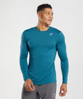 gymshark-arrival-long-sleeve-t-shirt-atlantic-blue-aw22