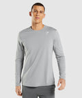gymshark-arrival-long-sleeve-t-shirt-smokey-grey-ss22