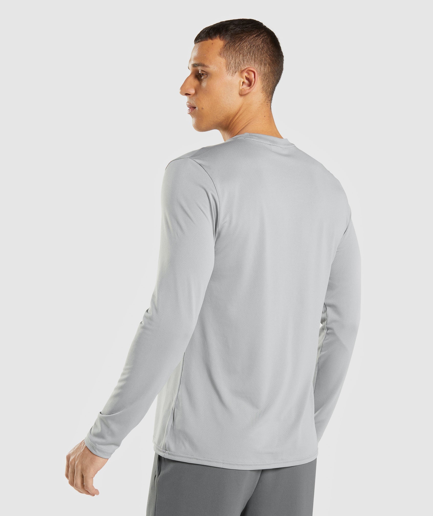 gymshark-arrival-long-sleeve-t-shirt-smokey-grey-ss22