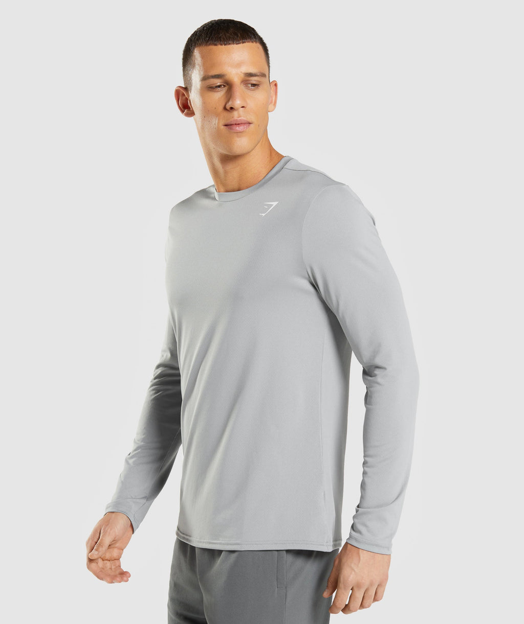 gymshark-arrival-long-sleeve-t-shirt-smokey-grey-ss22