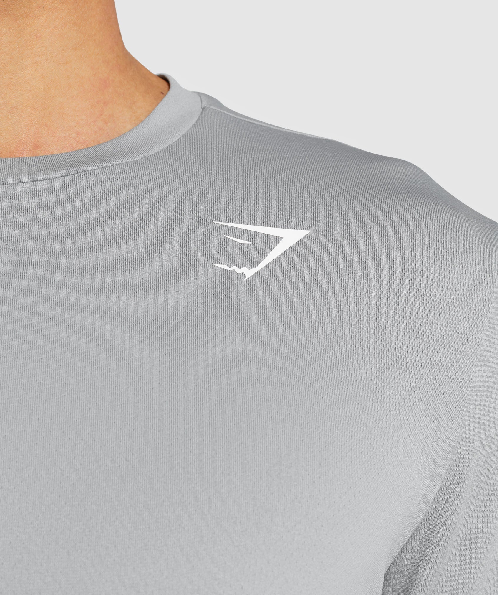 gymshark-arrival-long-sleeve-t-shirt-smokey-grey-ss22