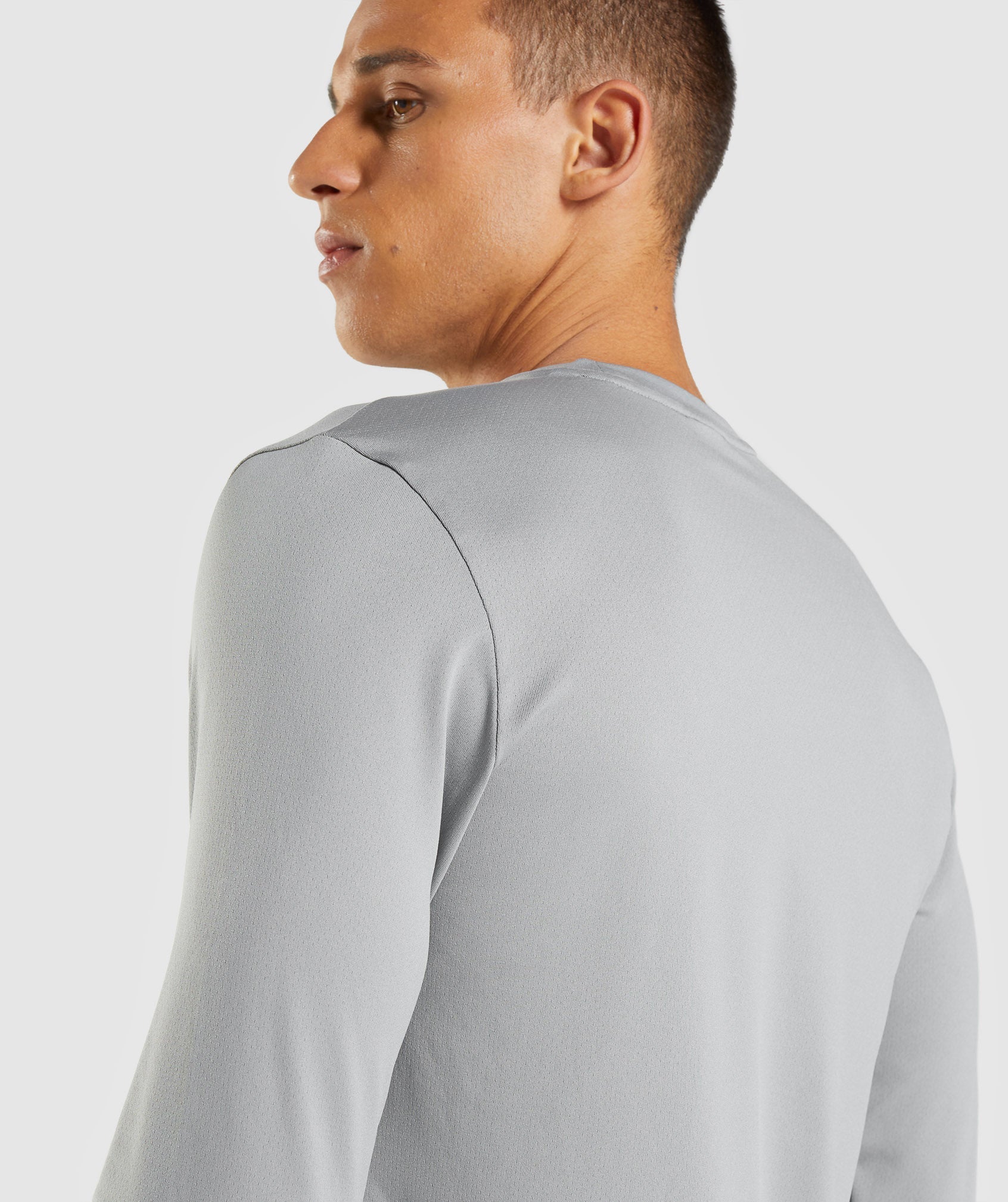 gymshark-arrival-long-sleeve-t-shirt-smokey-grey-ss22