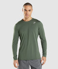 gymshark-arrival-long-sleeve-t-shirt-green-gsaw21