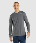 gymshark-arrival-long-sleeve-t-shirt-charcoal-gsaw21