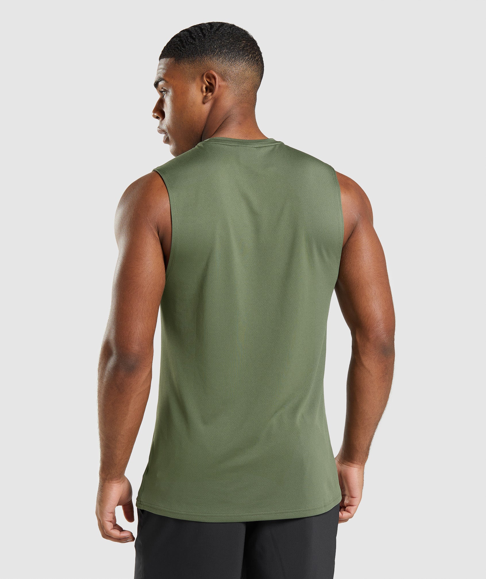 gymshark-arrival-sleeveless-t-shirt-core-olive-ss22