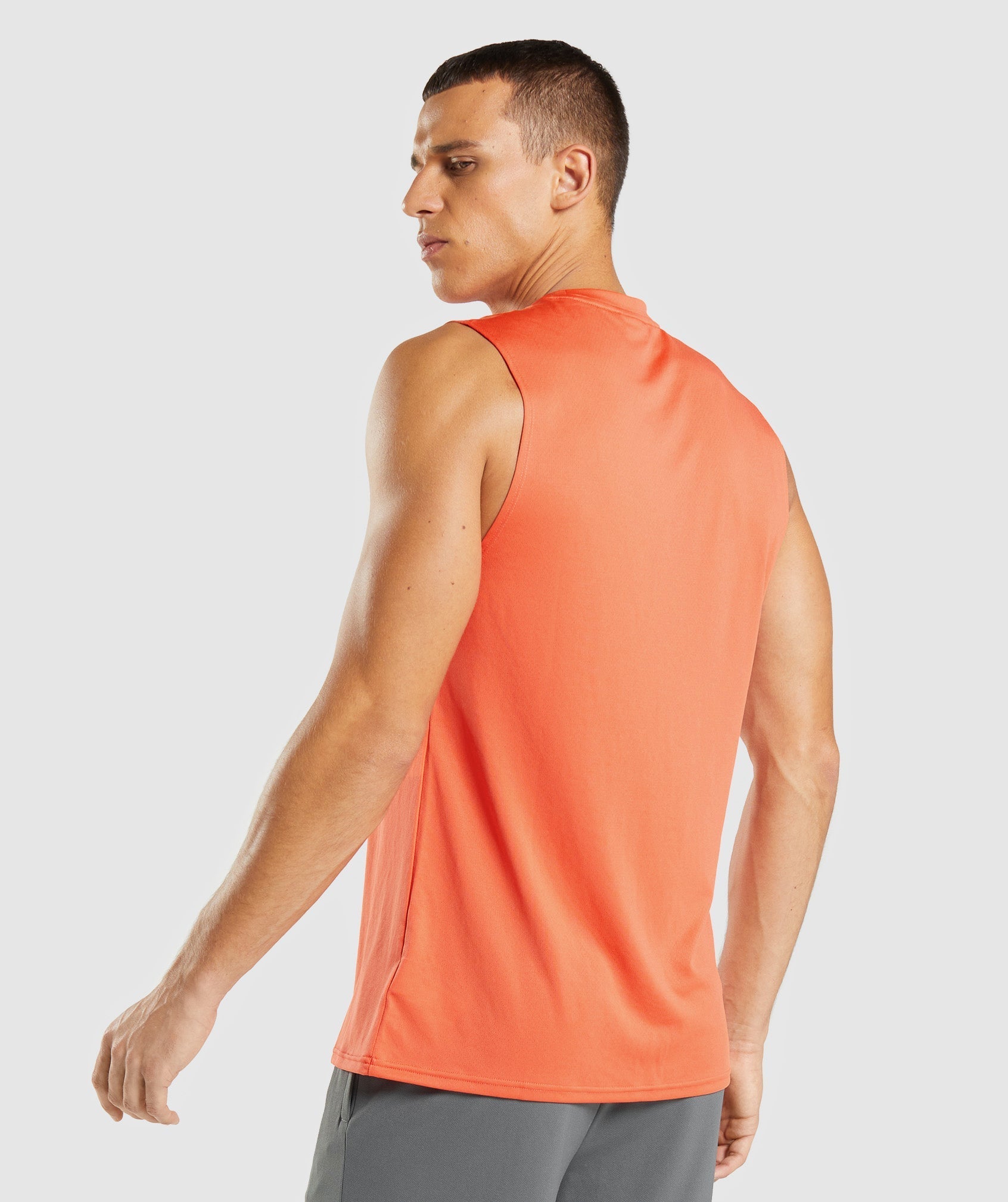 gymshark-arrival-sleeveless-t-shirt-papaya-orange-ss22