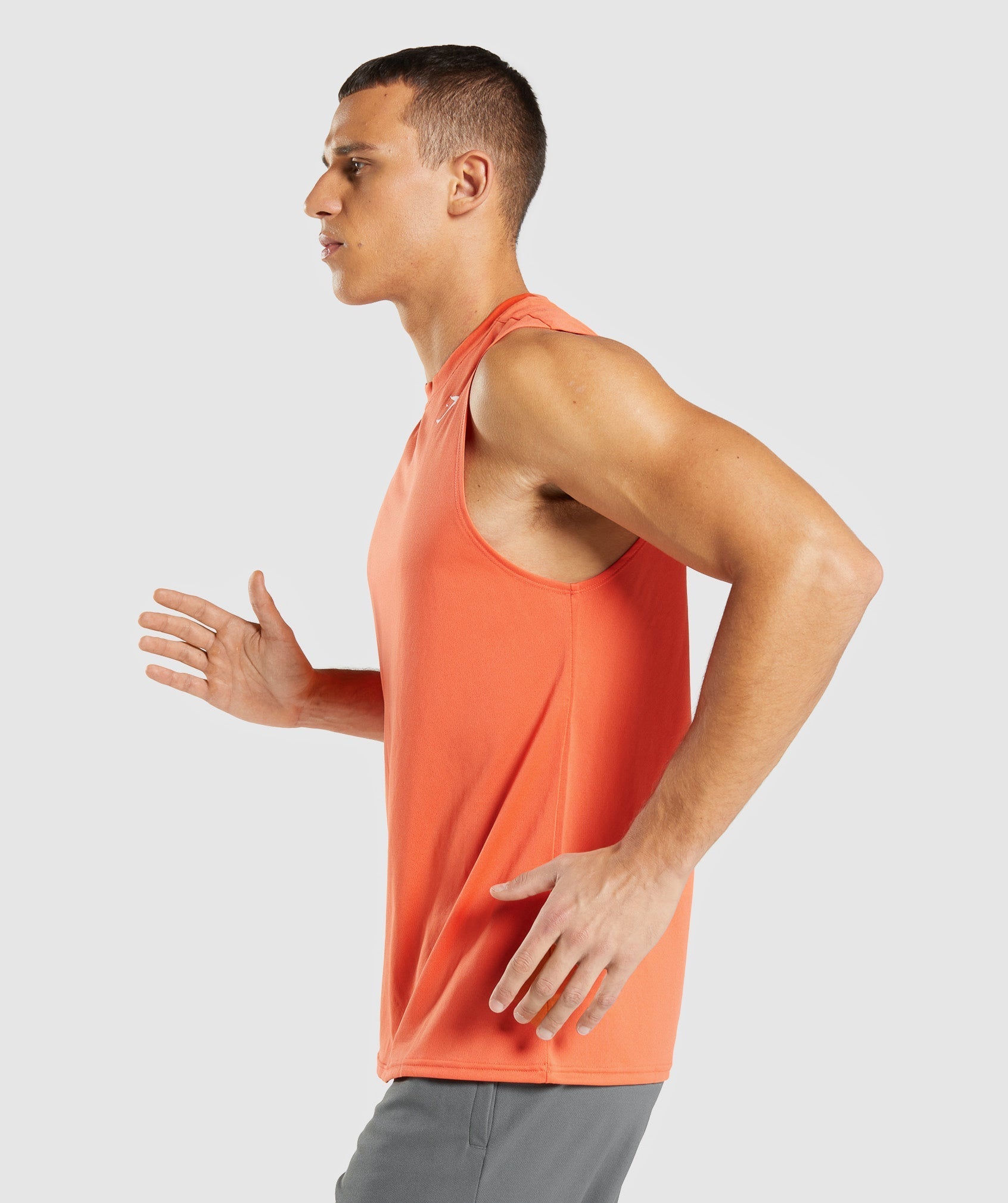 gymshark-arrival-sleeveless-t-shirt-papaya-orange-ss22
