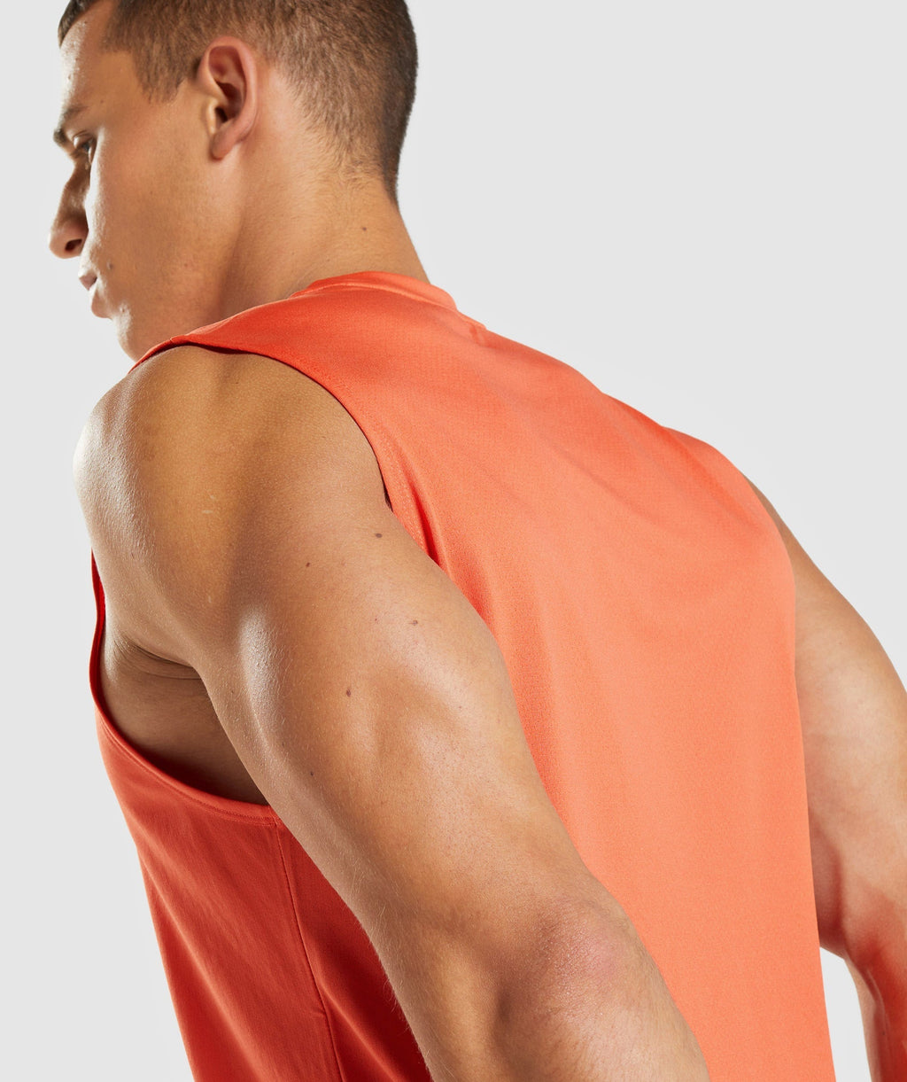 gymshark-arrival-sleeveless-t-shirt-papaya-orange-ss22