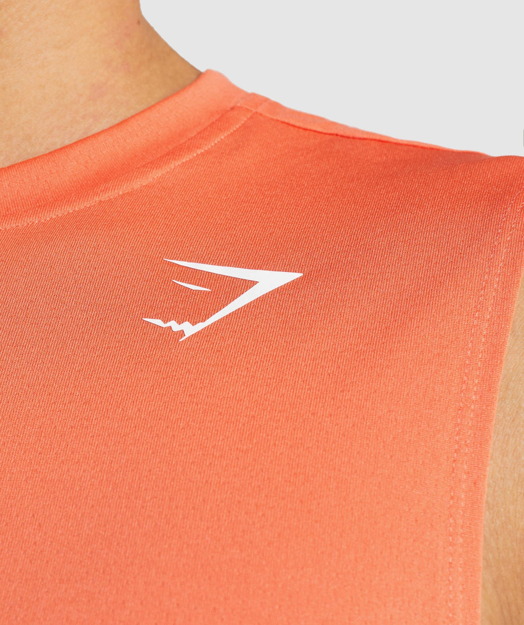 gymshark-arrival-sleeveless-t-shirt-papaya-orange-ss22