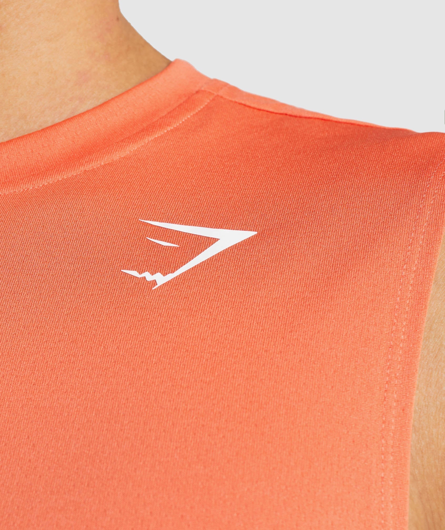 gymshark-arrival-sleeveless-t-shirt-papaya-orange-ss22