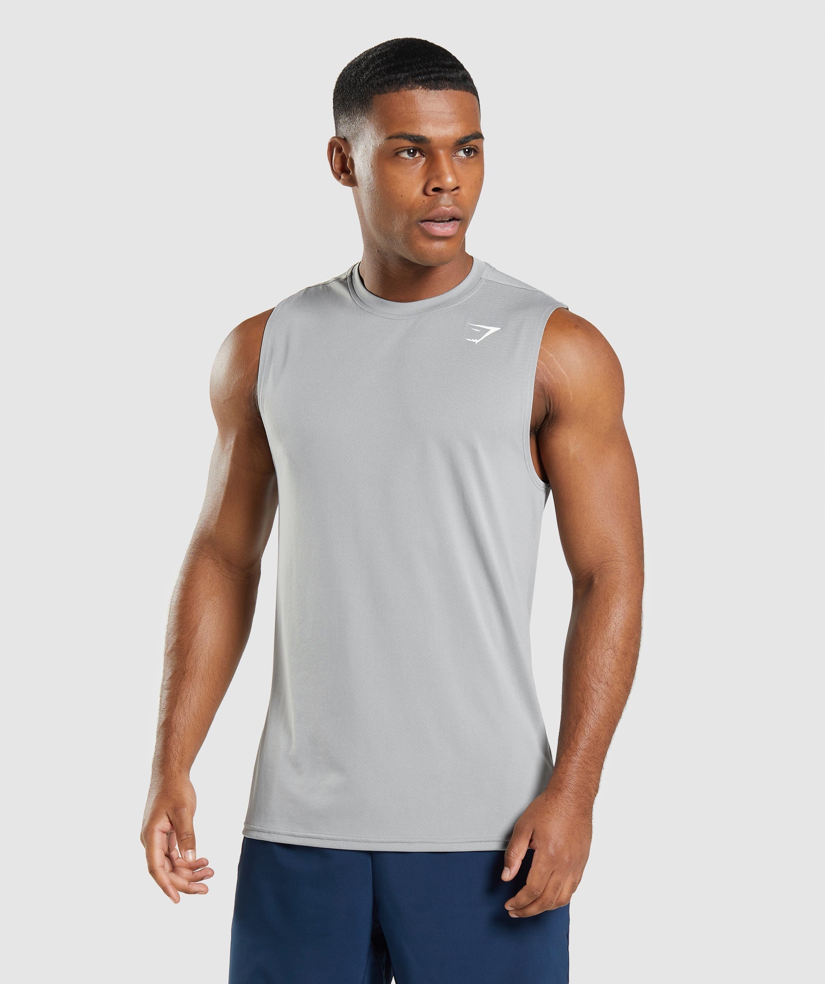 gymshark-arrival-sleeveless-t-shirt-smokey-grey-ss22