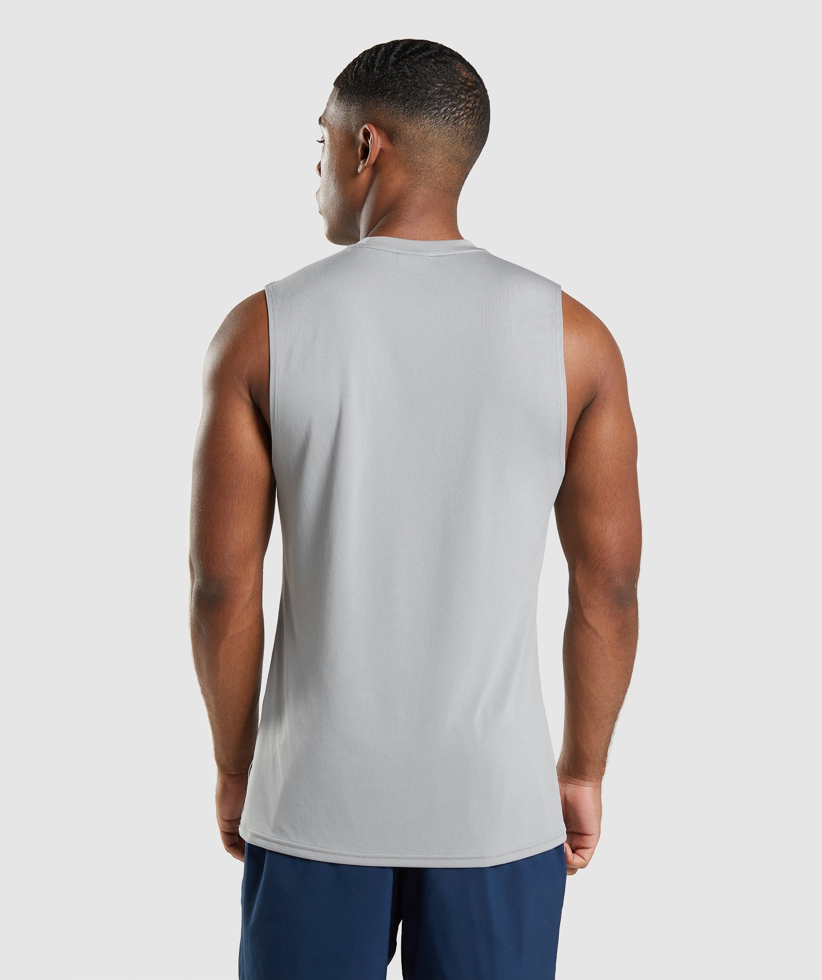 gymshark-arrival-sleeveless-t-shirt-smokey-grey-ss22