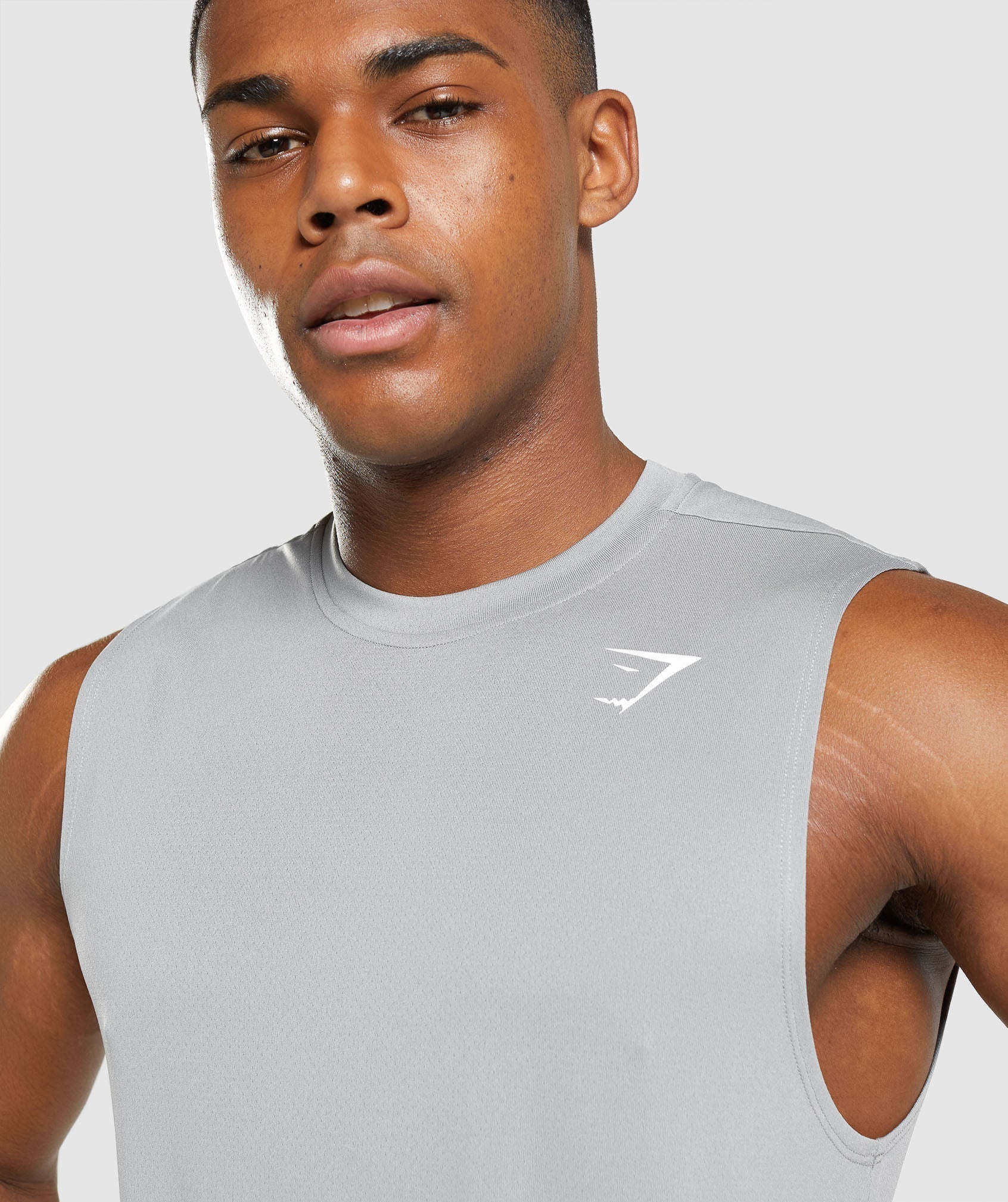 gymshark-arrival-sleeveless-t-shirt-smokey-grey-ss22