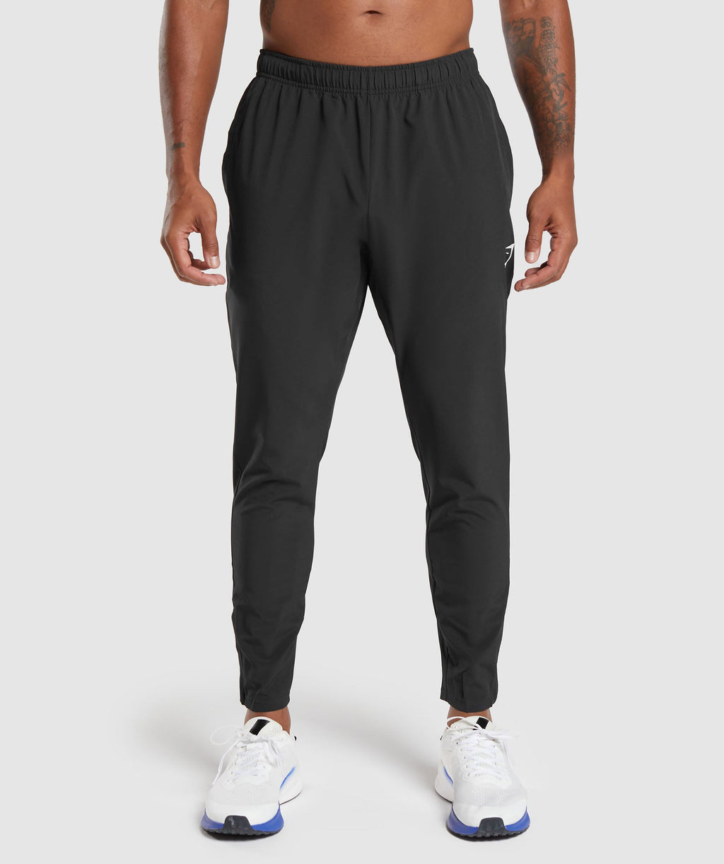 gymshark-arrival-woven-joggers-black-ss22