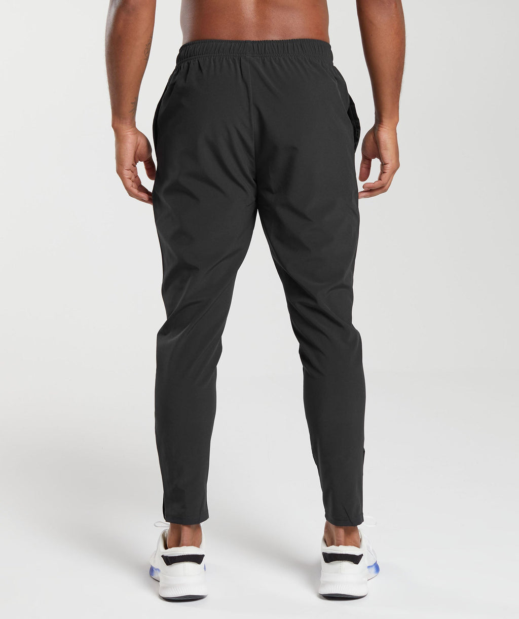 gymshark-arrival-woven-joggers-black-ss22