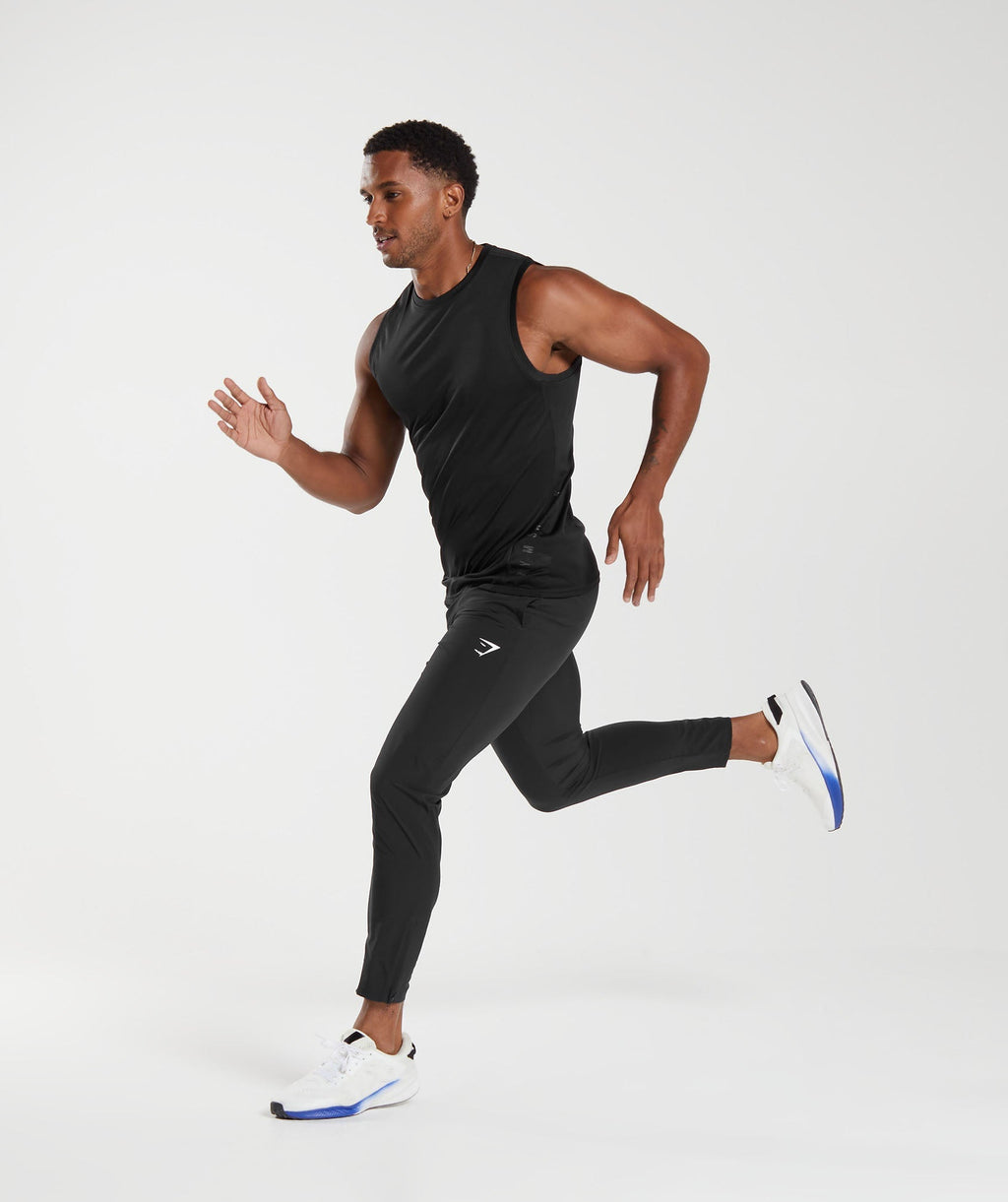 gymshark-arrival-woven-joggers-black-ss22