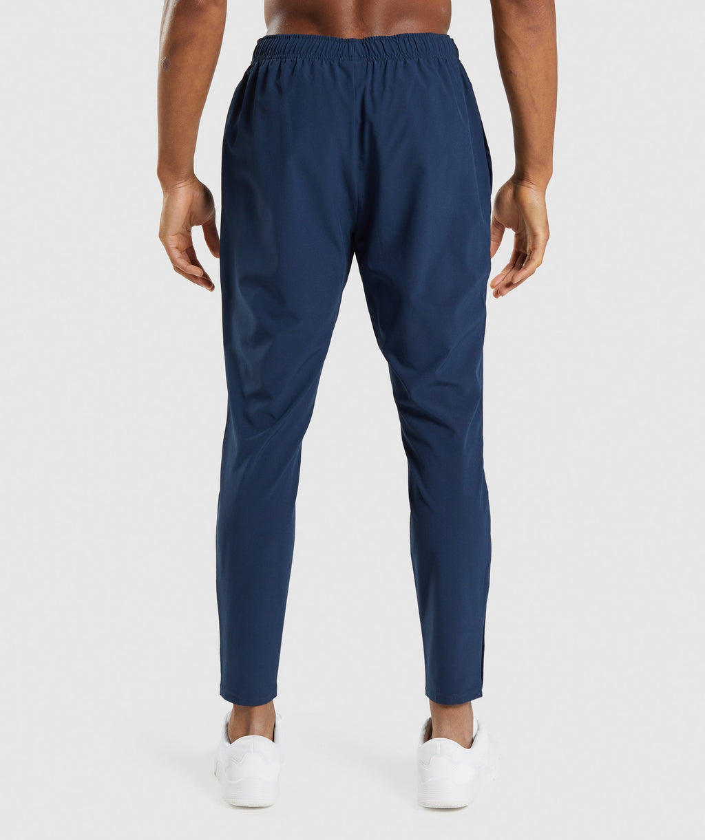gymshark-arrival-woven-joggers-navy-ss22