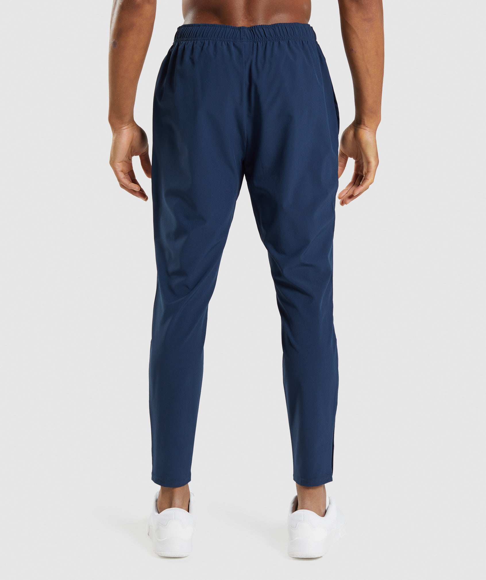 gymshark-arrival-woven-joggers-navy-ss22
