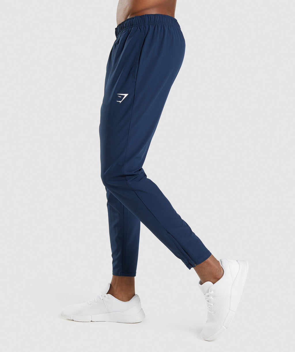 gymshark-arrival-woven-joggers-navy-ss22