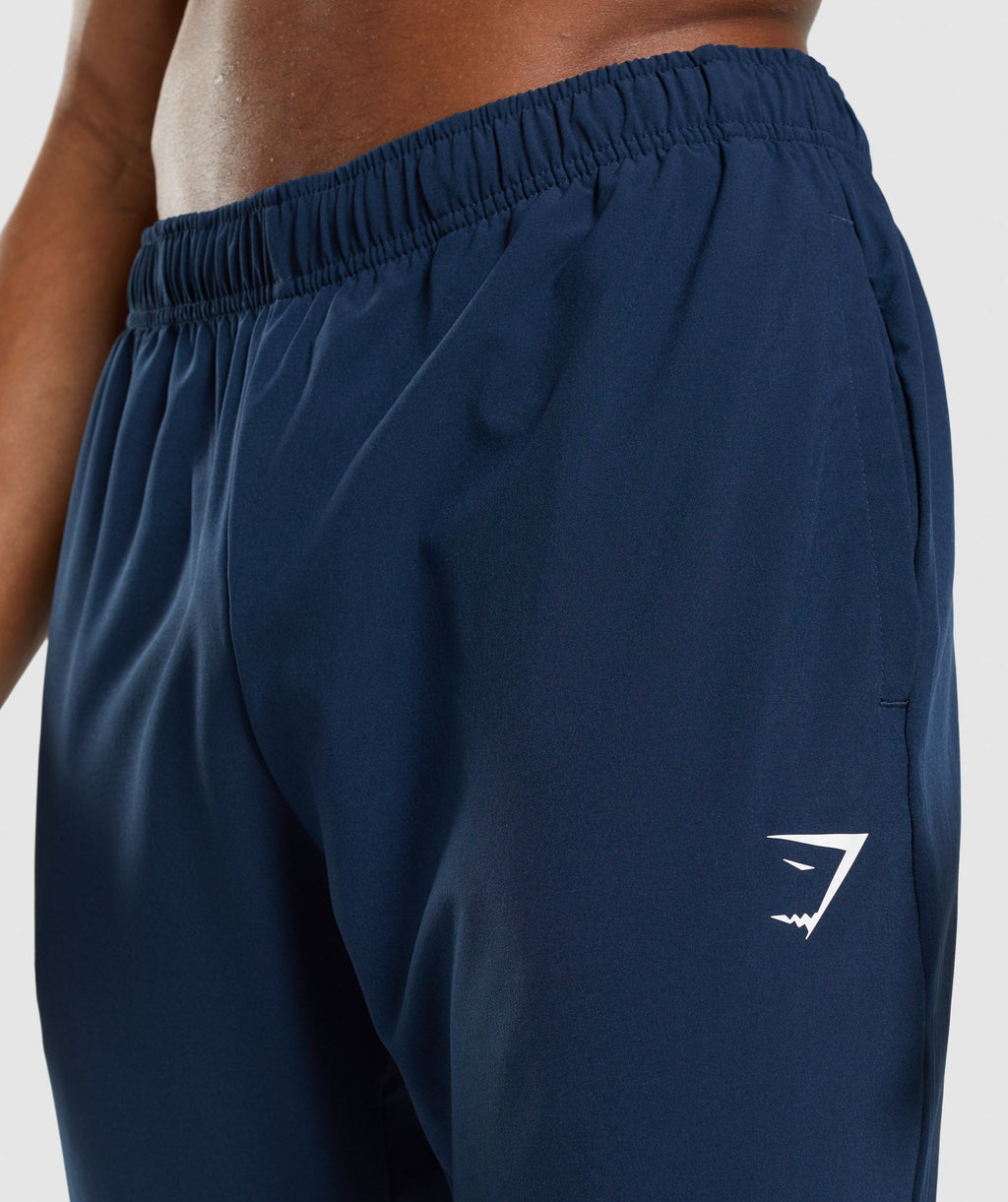 gymshark-arrival-woven-joggers-navy-ss22