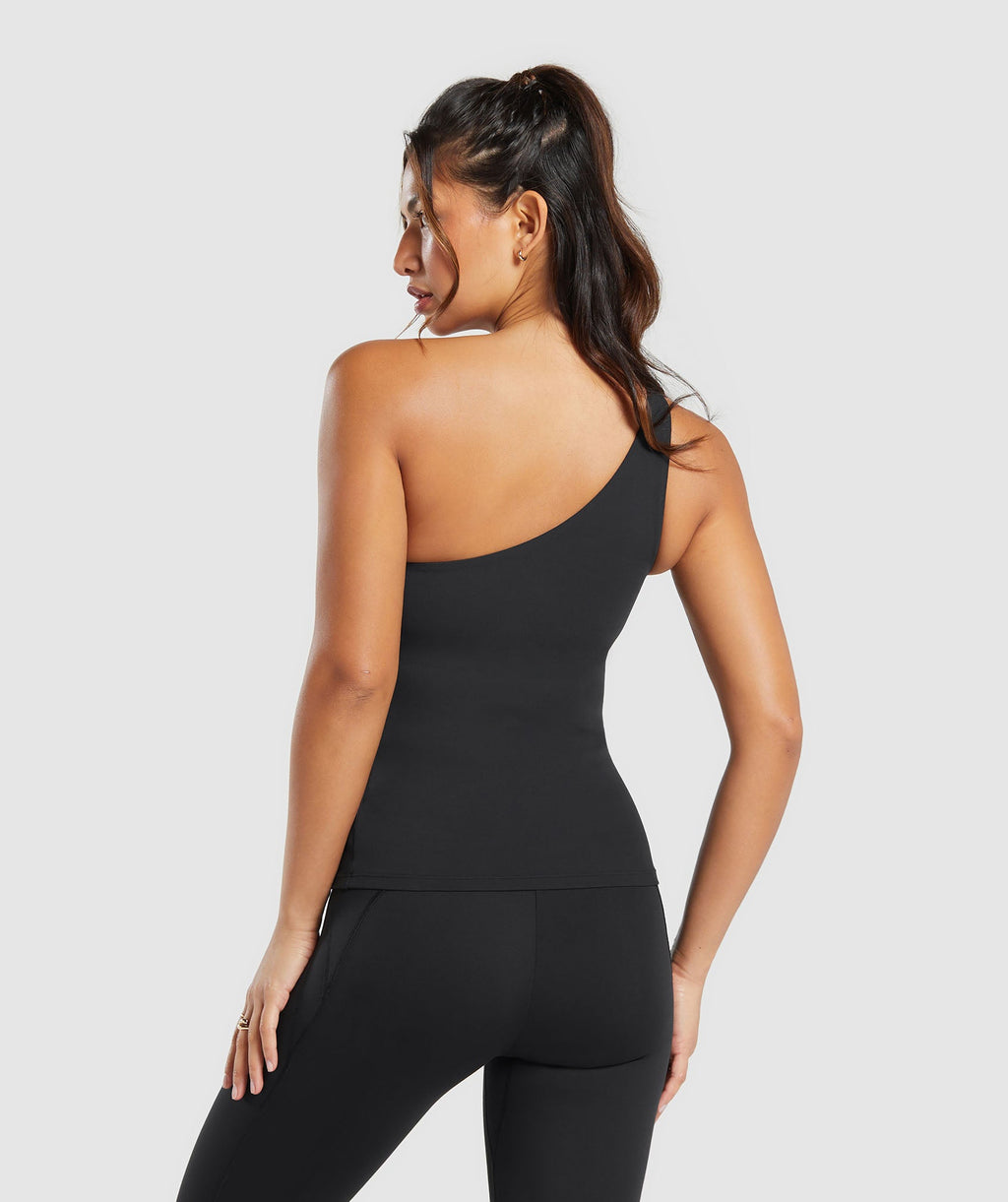 gymshark-asymmetric-shelf-tank-black-ss24