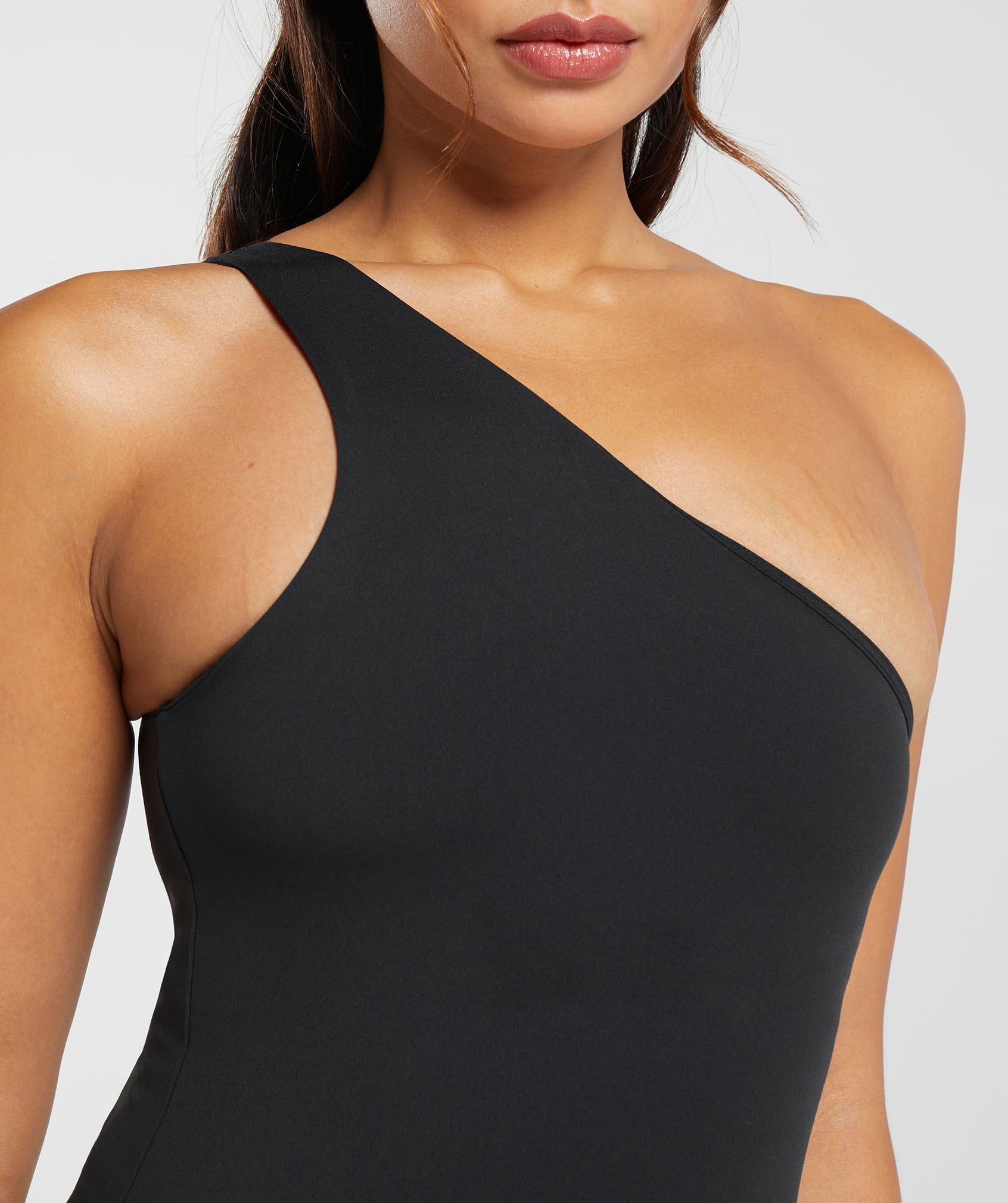 gymshark-asymmetric-shelf-tank-black-ss24