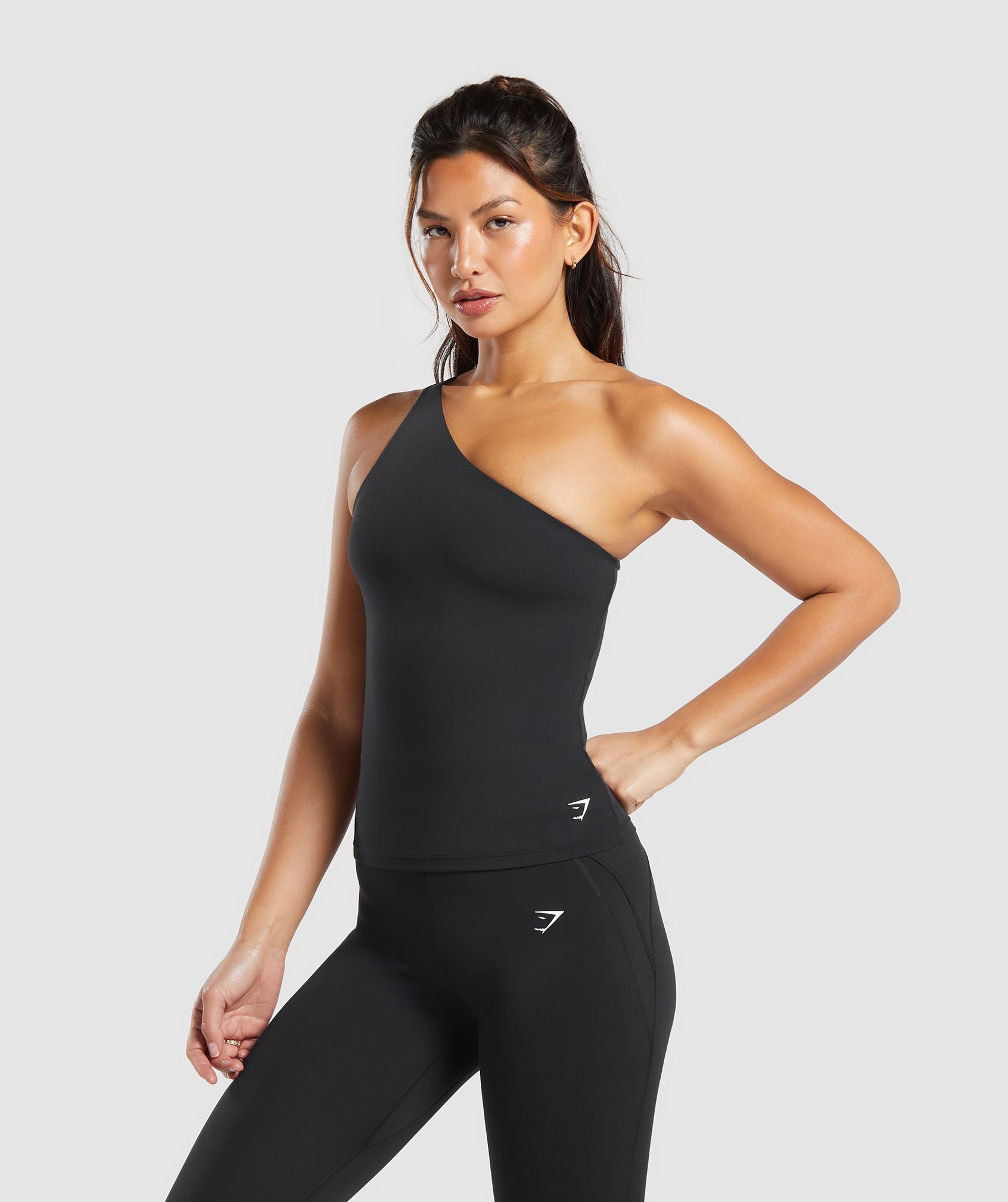 gymshark-asymmetric-shelf-tank-black-ss24