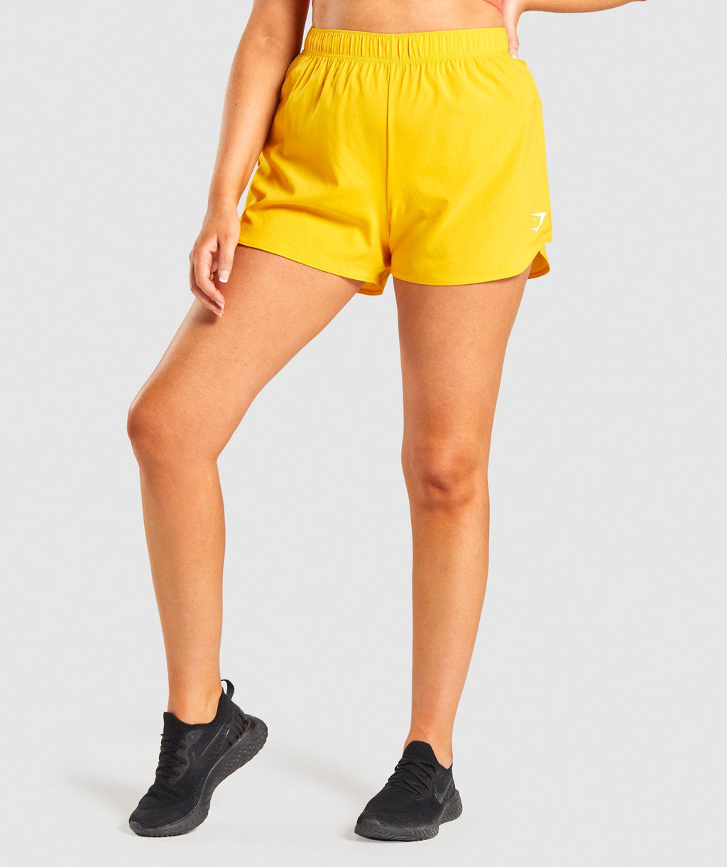 gymshark-essential-loose-training-shorts-yellow