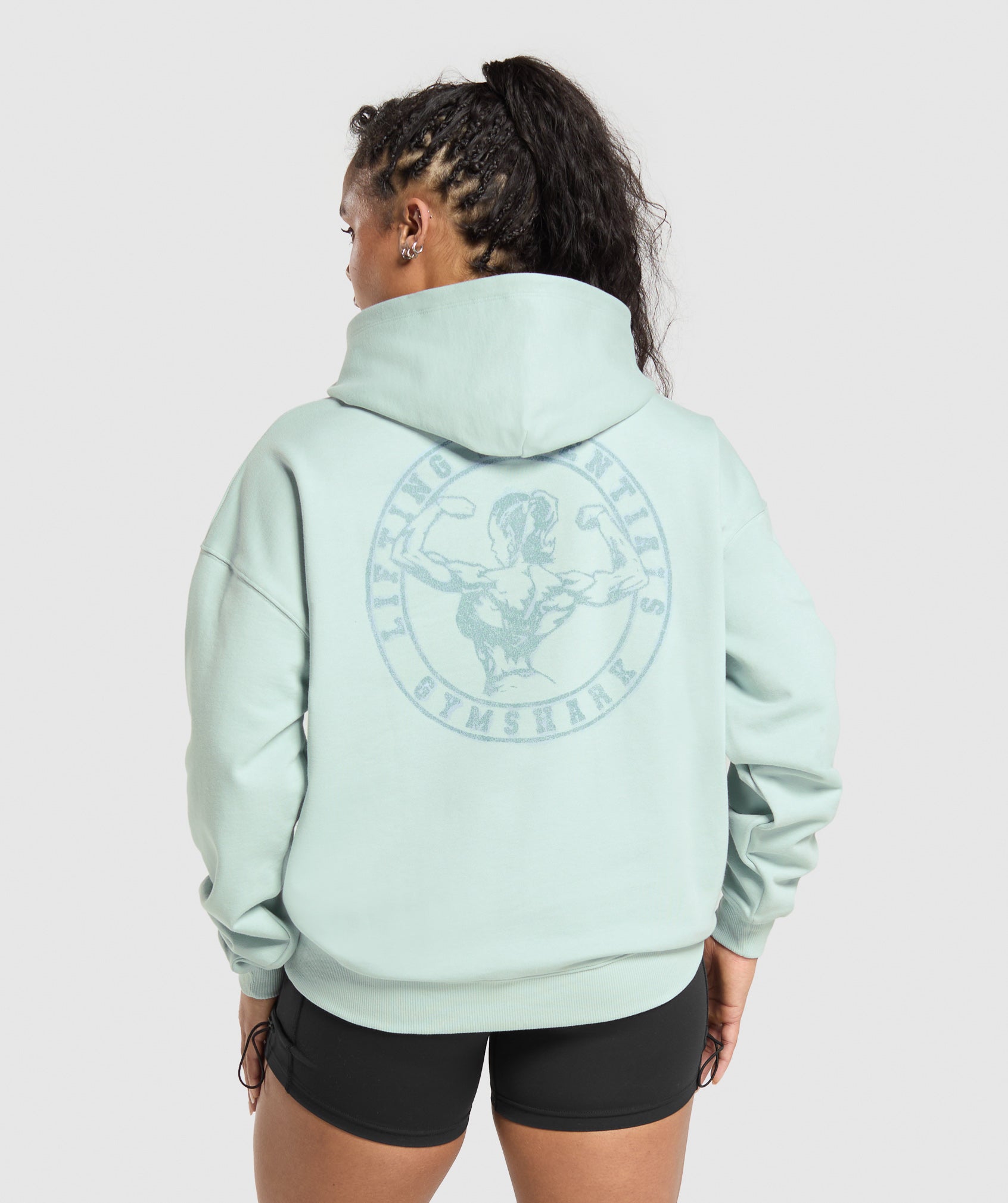 gymshark-back-gains-graphic-hoodie-morning-blue-ss25