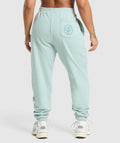 gymshark-back-gains-graphic-joggers-morning-blue-ss25