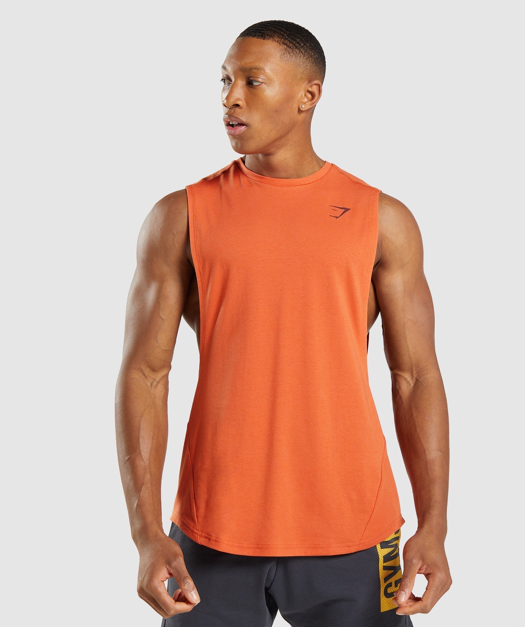 gymshark-bold-drop-arm-tank-clay-orange-ss22