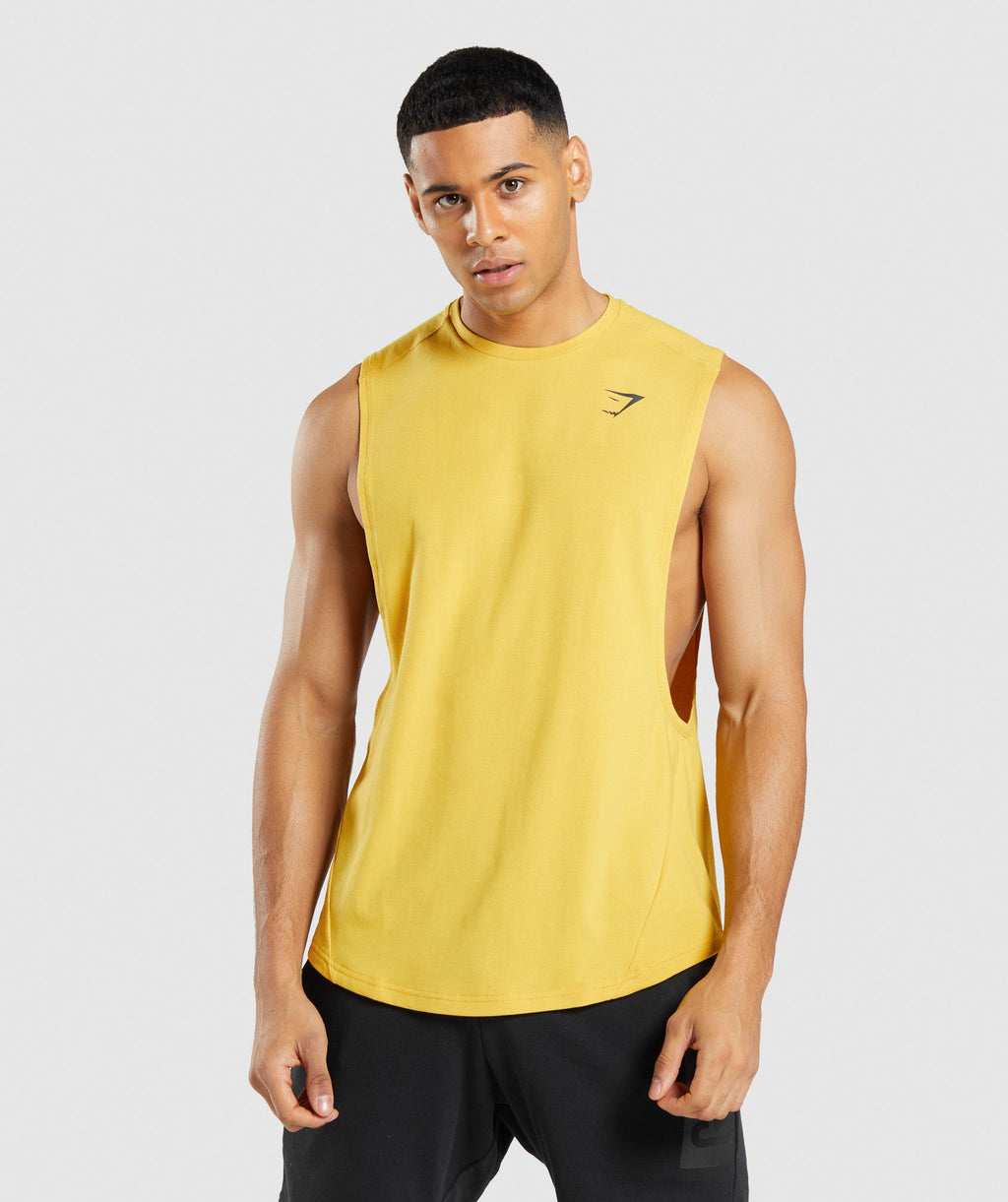 gymshark-bold-drop-arm-tank-medallion-yellow-ss22