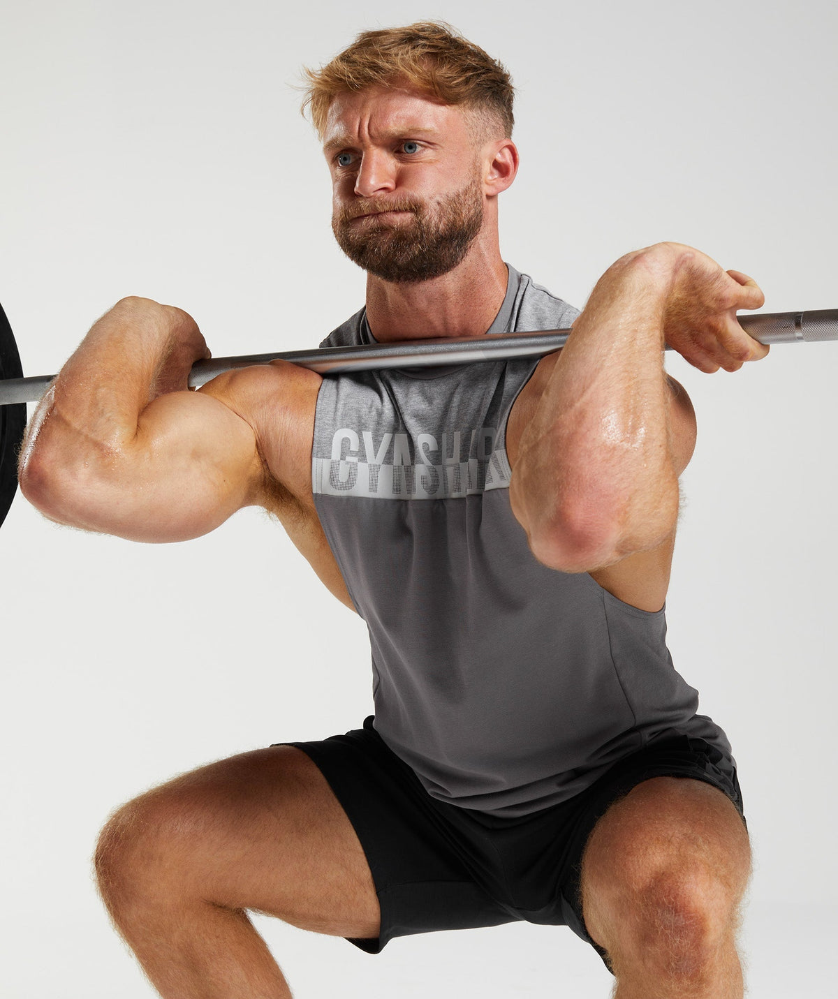 gymshark-bold-react-drop-arm-tank-coin-grey-aw22