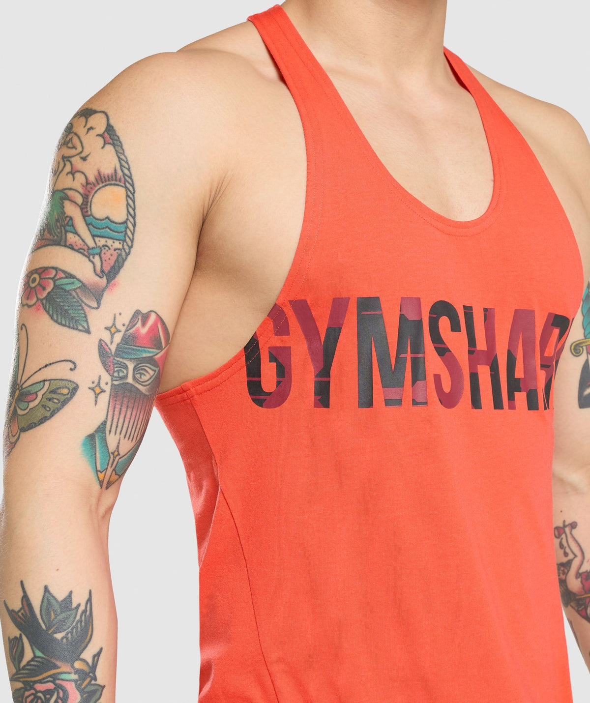 gymshark-bold-stringer-orange-camo