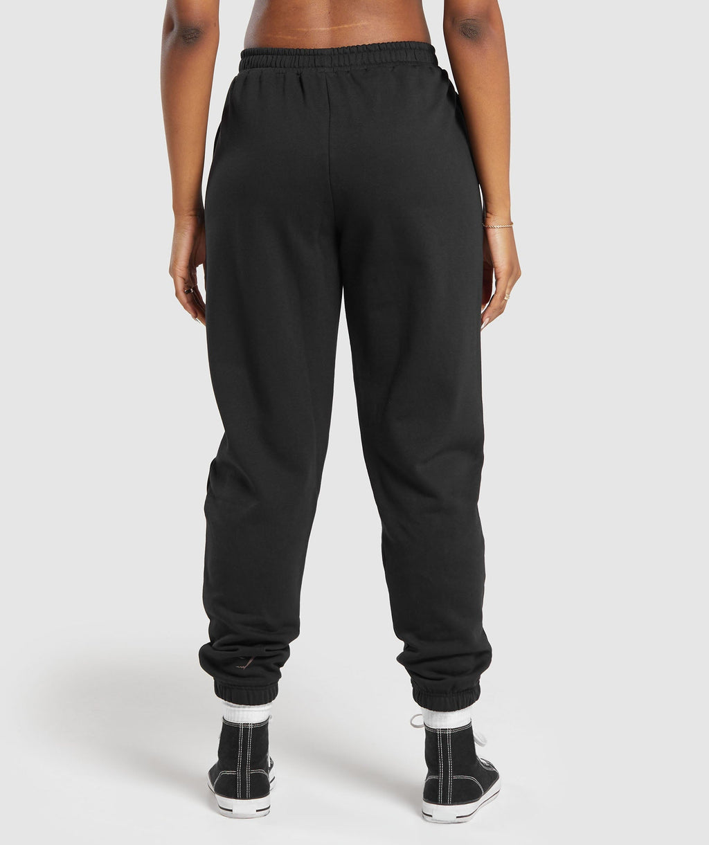gymshark-built-graphic-joggers-black-aw23