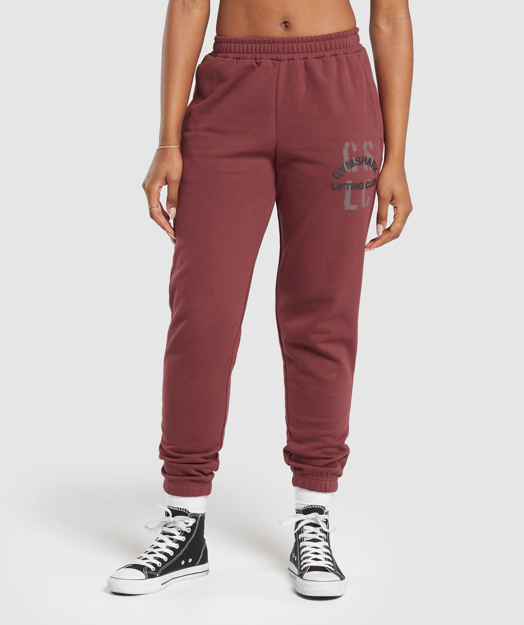 gymshark-built-graphic-joggers-washed-burgundy-aw23