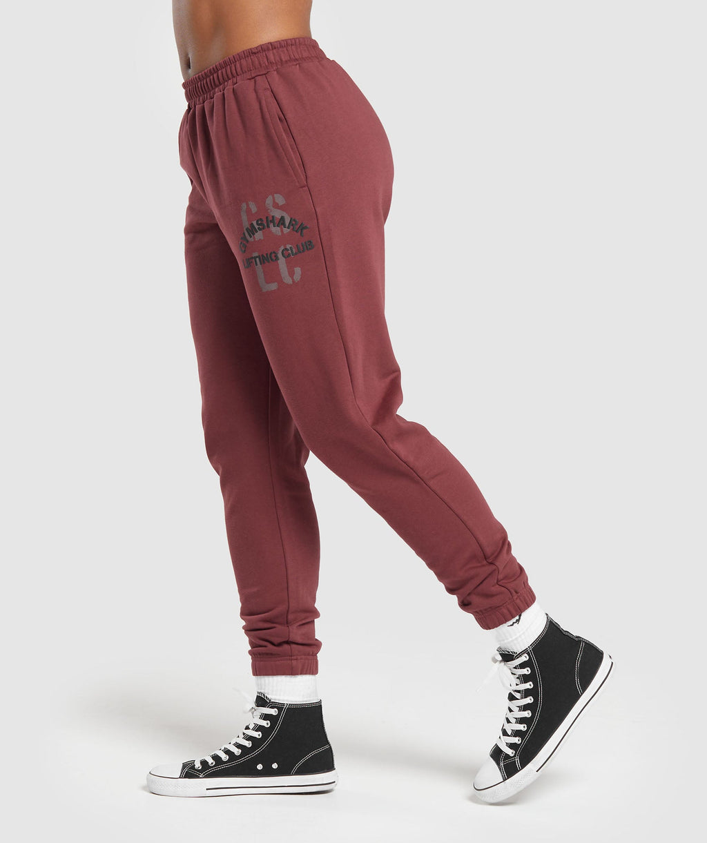 gymshark-built-graphic-joggers-washed-burgundy-aw23
