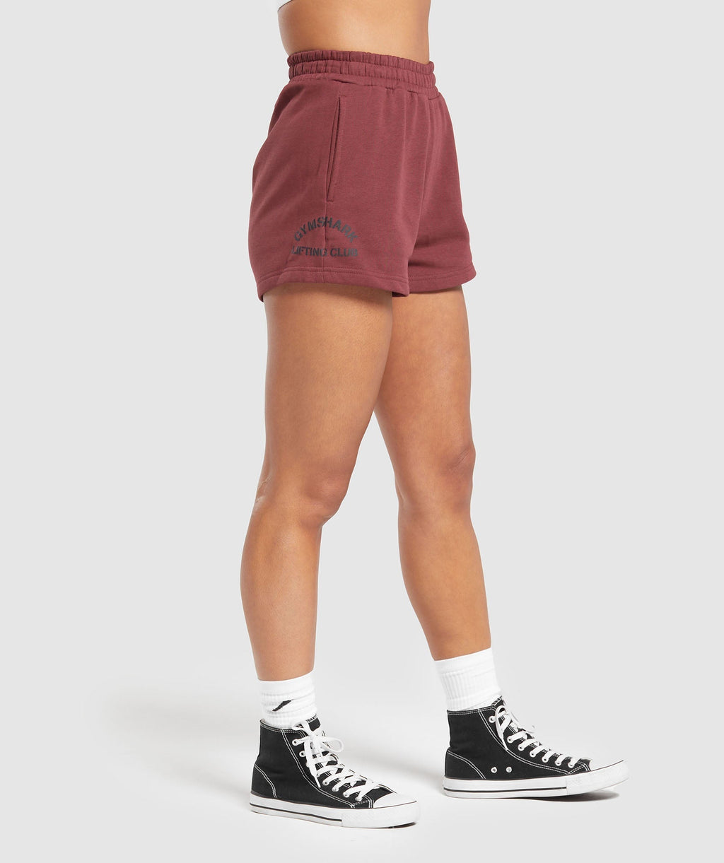 gymshark-built-graphic-shorts-washed-burgundy-aw23