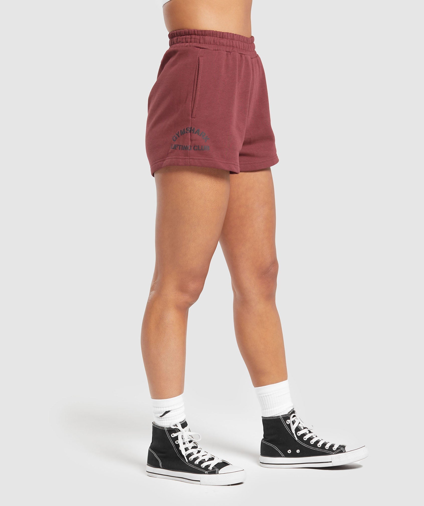 gymshark-built-graphic-shorts-washed-burgundy-aw23