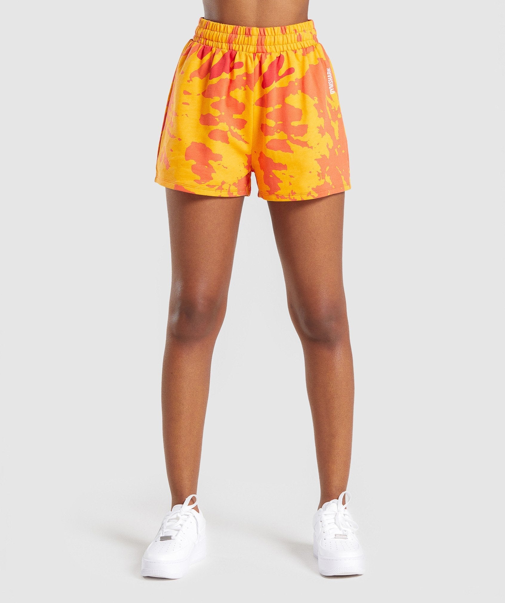 gymshark-colour-burst-shorts-orange-print