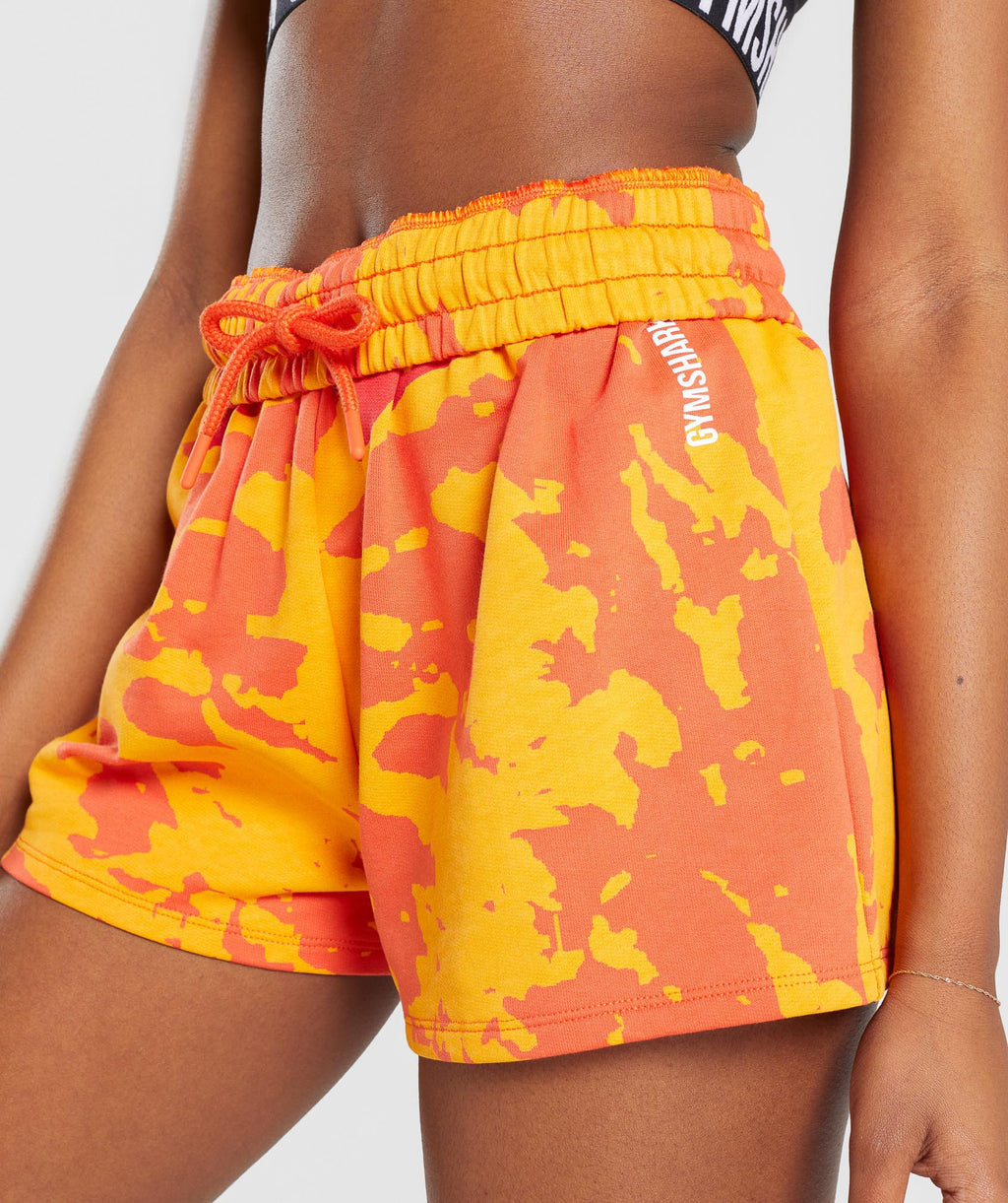 gymshark-colour-burst-shorts-orange-print
