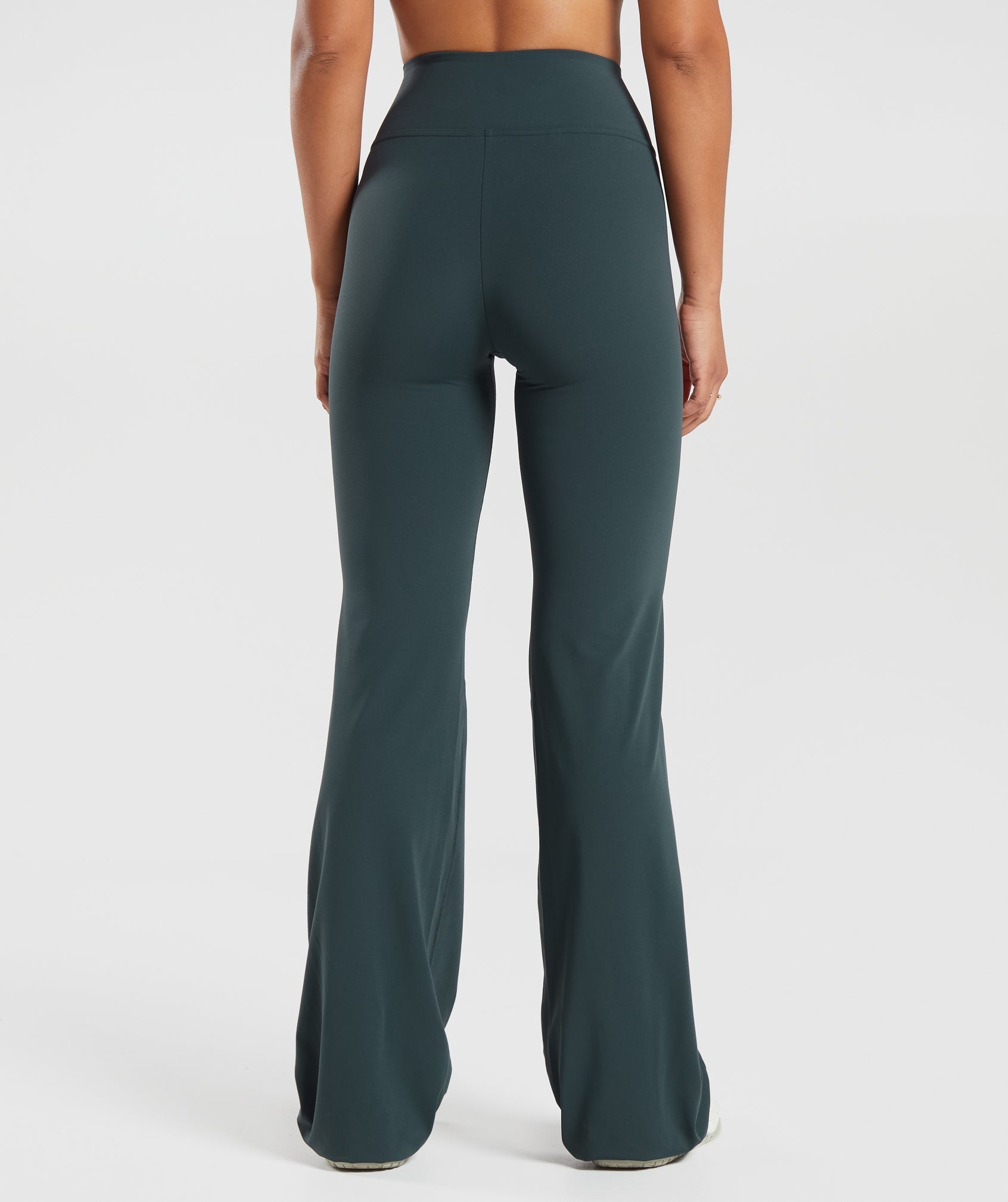gymshark-crossover-tall-flared-leggings-darkest-teal-aw23