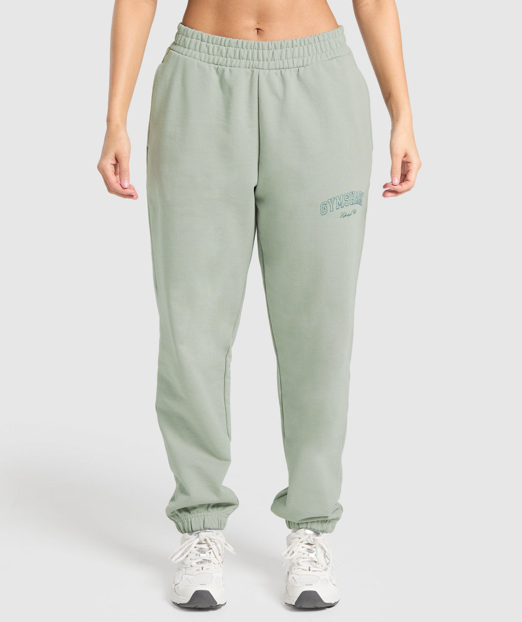 gymshark-campus-classics-graphic-joggers-stone-grey-ss25