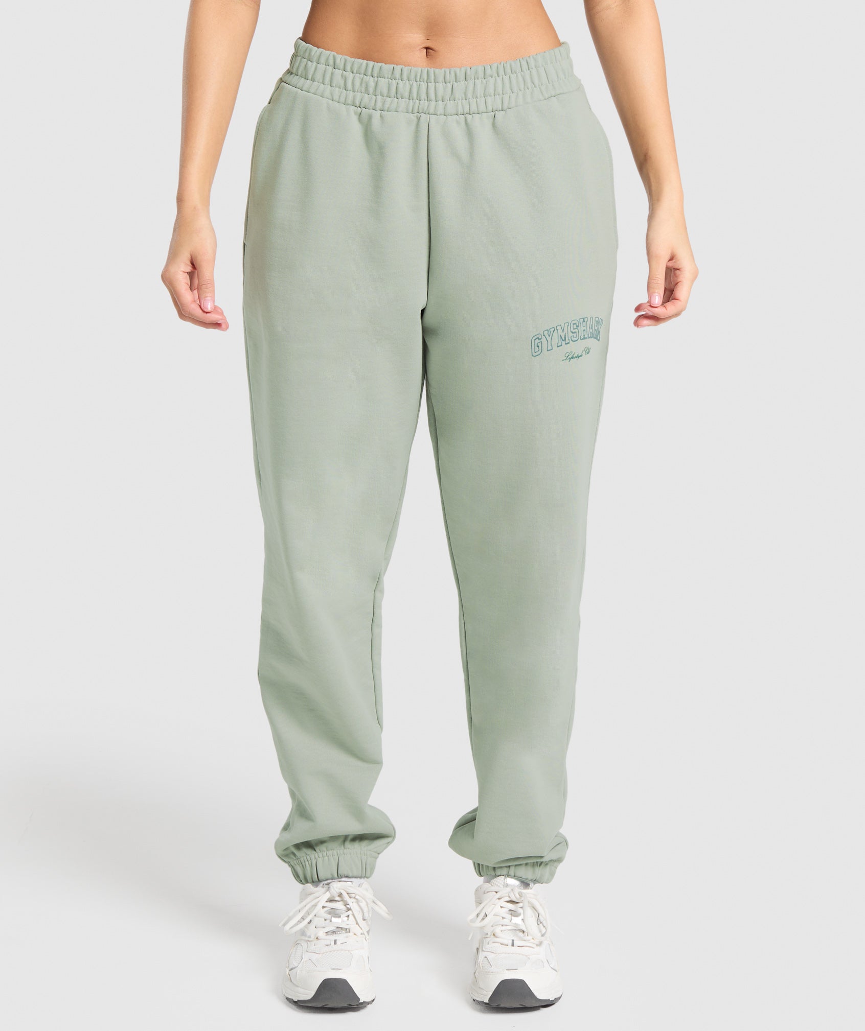 gymshark-campus-classics-graphic-joggers-stone-grey-ss25