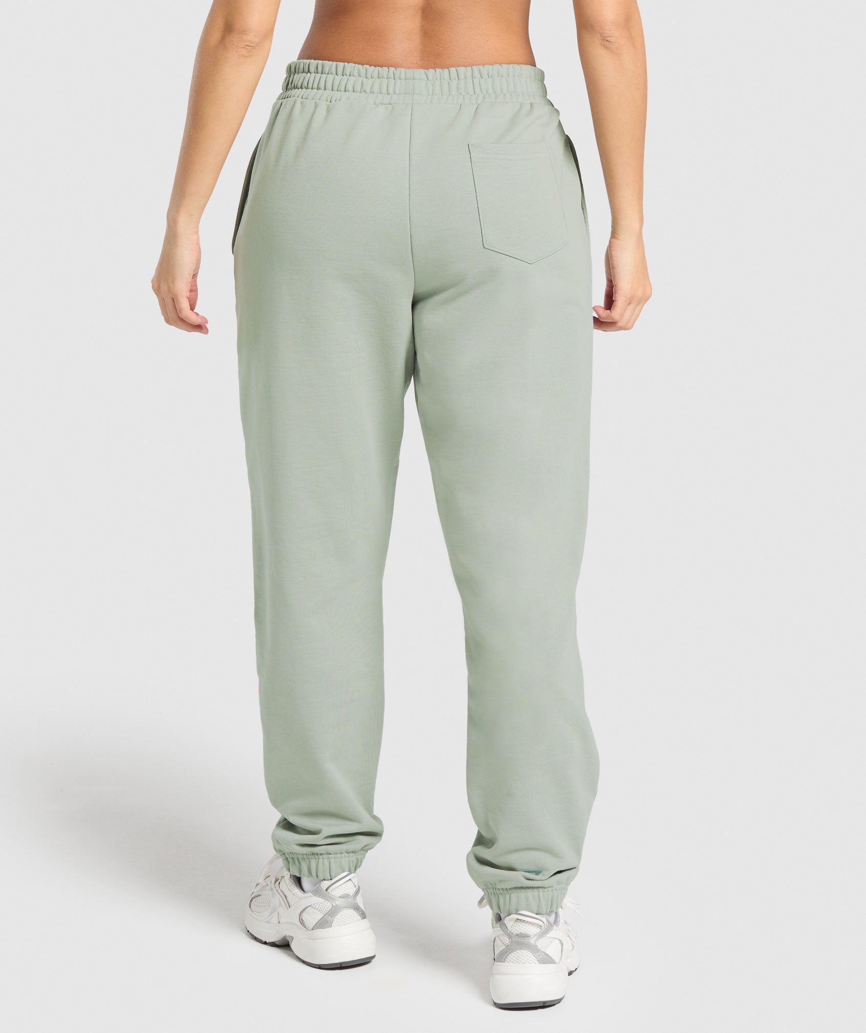 gymshark-campus-classics-graphic-joggers-stone-grey-ss25