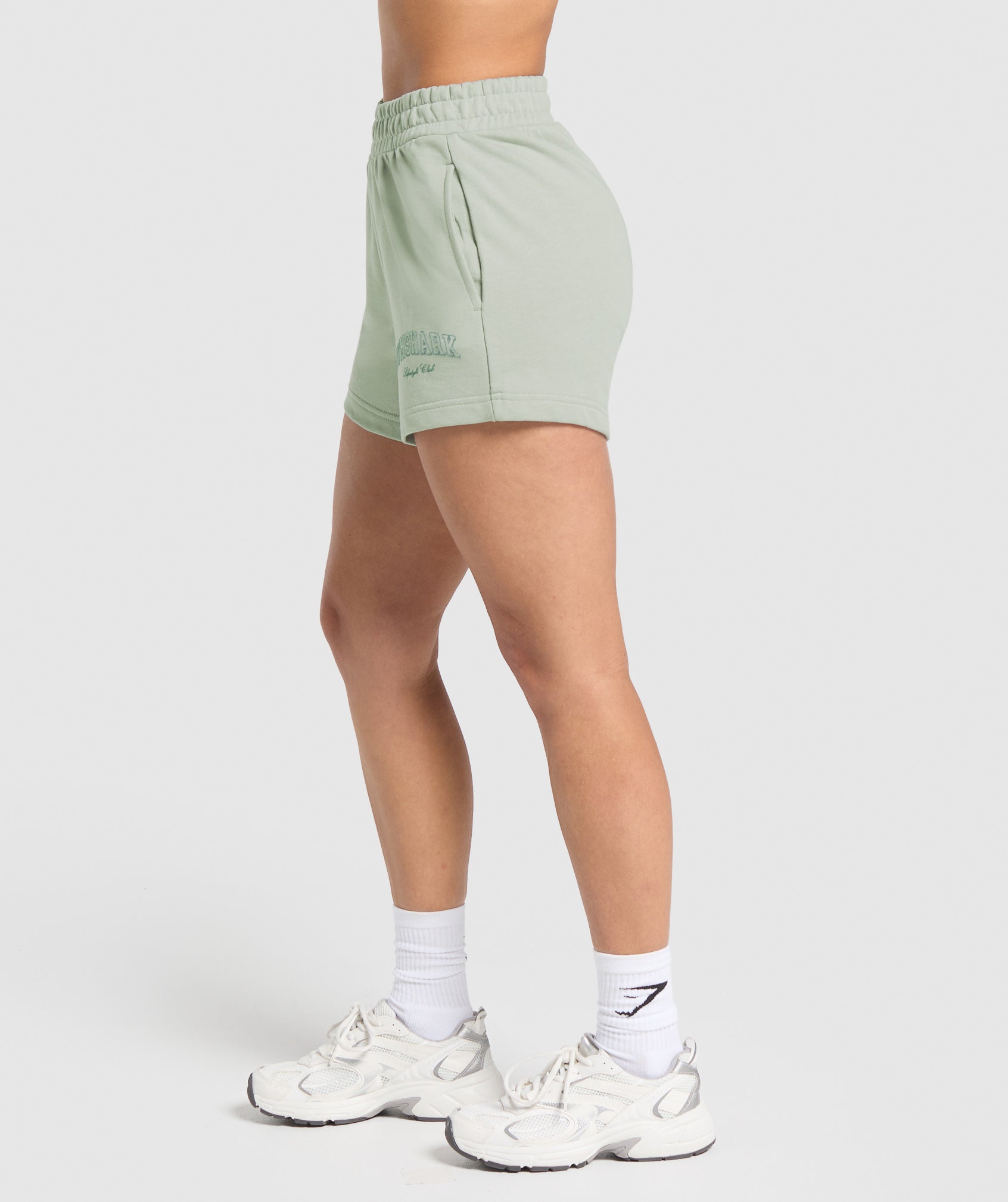 gymshark-campus-classics-graphic-sweat-shorts-stone-grey-ss25
